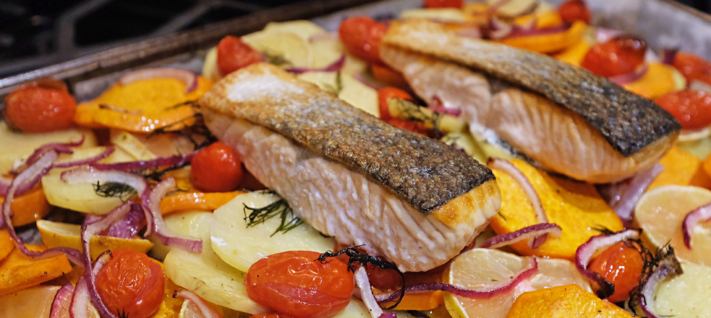 “crisp-salmon-root-vegetables-tomatoes-red-onion-potaotoes-sweet-potatoes-dill-lemon-sheet-pan”>"